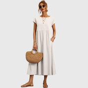 Théodeline Whitmore | Navy Blue Cap Sleeve Midi Dress with Pockets