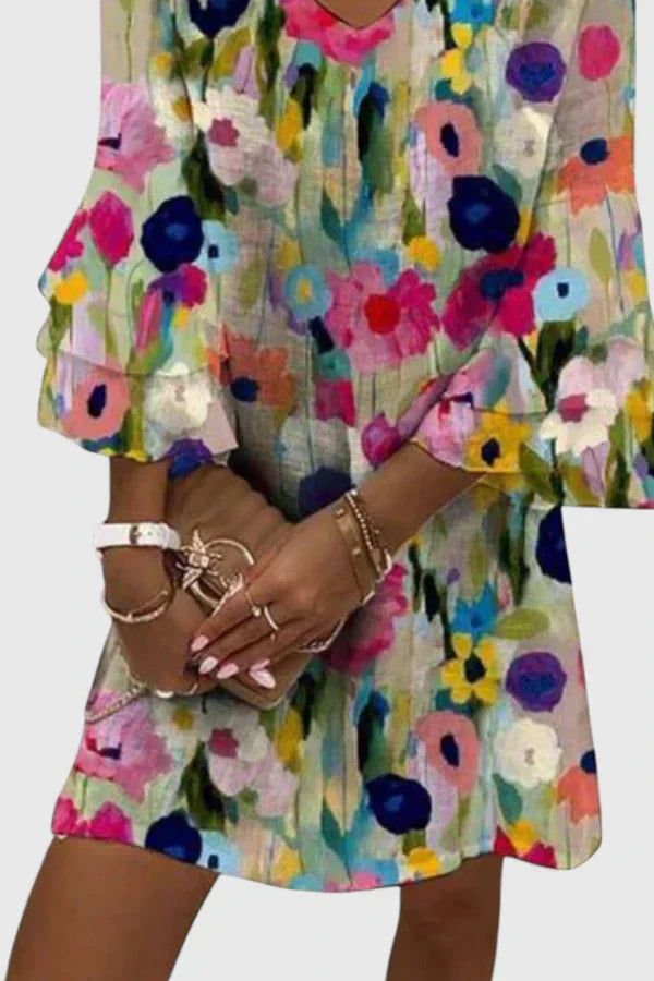Celestine Beauvray | Floral Print V-Neck Mini Dress with Ruffle Sleeves