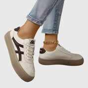 Lucette Vanbrough | White & Navy Lace-Up Platform Sneakers
