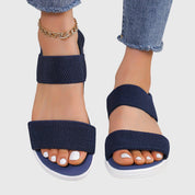 Solène Faircastle | Black Double-Strap Flat Sandals with White Sole
