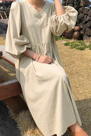 Céleste Fonvielle | Terracotta V-Neck Smocked Waist Midi Dress with Balloon Sleeves