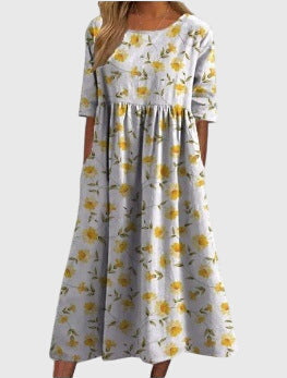 Célimène Fairgrove | Blue Floral Midi Dress with Half Sleeves