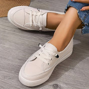 Emmeline Whitford | White Faux Leather Lace-Up Low Top Sneakers