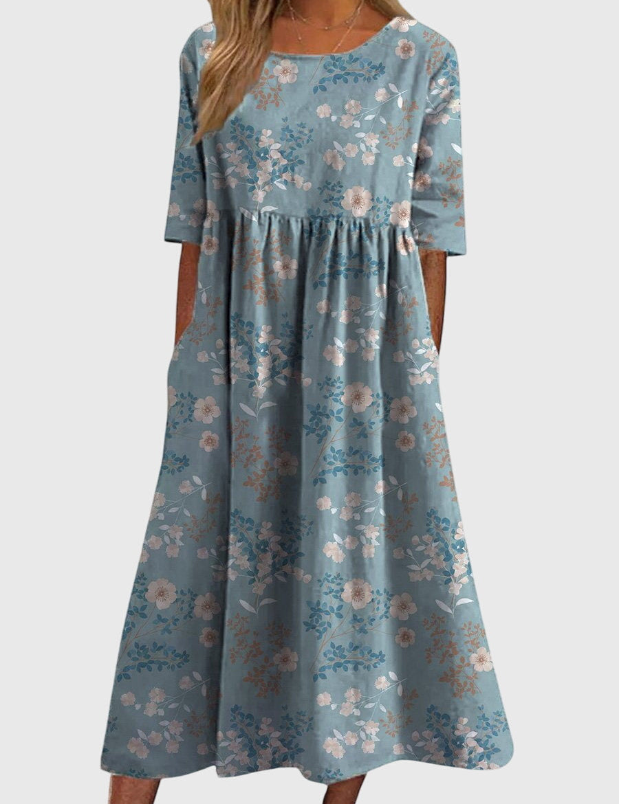Célimène Fairgrove | Blue Floral Midi Dress with Half Sleeves