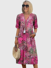 Celestine Dawnmere | Boho Floral Midi Dress with V-Neck