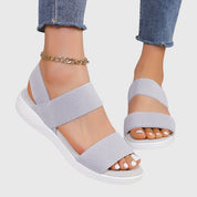 Solène Faircastle | Black Double-Strap Flat Sandals with White Sole
