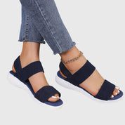 Solène Faircastle | Black Double-Strap Flat Sandals with White Sole