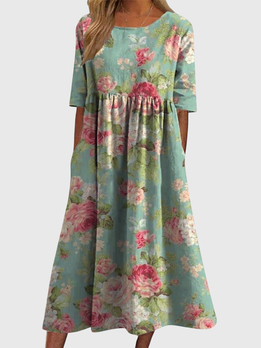 Célimène Fairgrove | Blue Floral Midi Dress with Half Sleeves