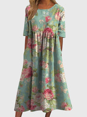 Célimène Fairgrove | Blue Floral Midi Dress with Half Sleeves