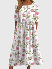 Célimène Fairgrove | Blue Floral Midi Dress with Half Sleeves
