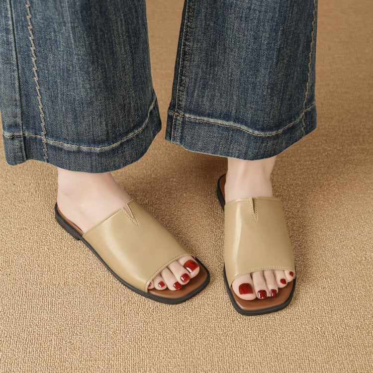 Margolaine Dubreuil | Black Faux Leather Flat Slide Sandals