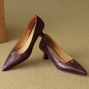 Rosanne Castellfort | Burgundy Leather Pointed-Toe Heels with Gold Rose Detail