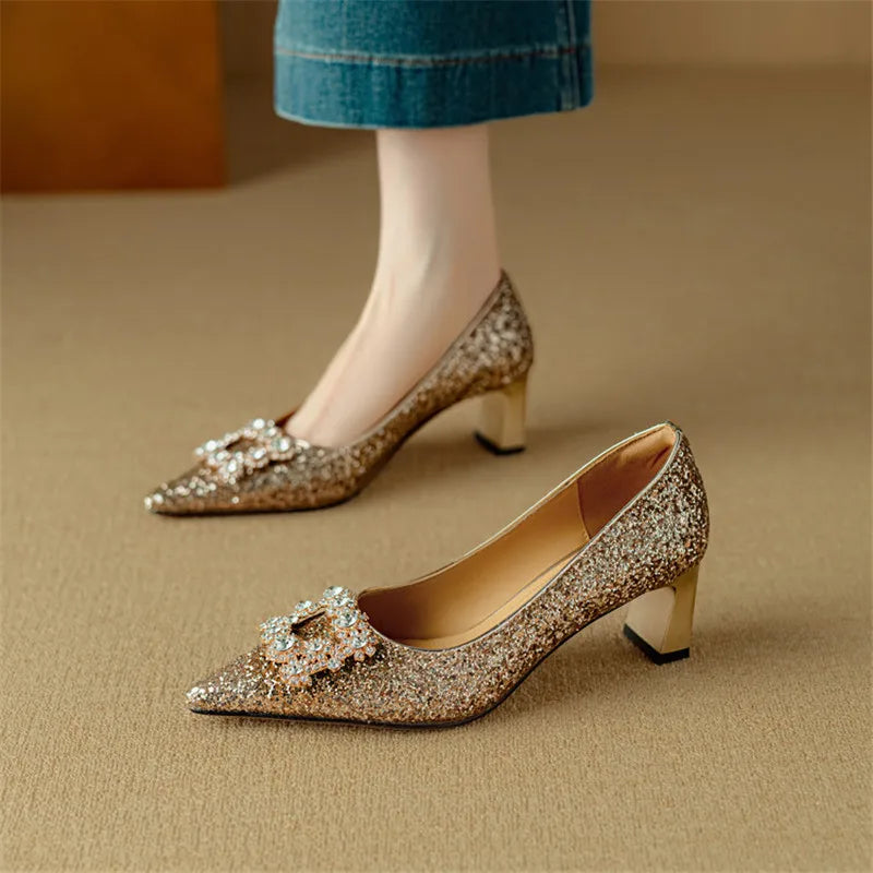 Estelle Ravenswood | Gold Glitter Block Heel Pumps with Crystal Buckle