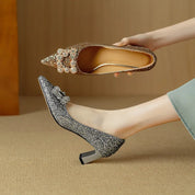 Estelle Ravenswood | Gold Glitter Block Heel Pumps with Crystal Buckle