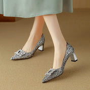 Estelle Ravenswood | Gold Glitter Block Heel Pumps with Crystal Buckle