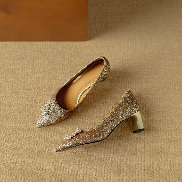Estelle Ravenswood | Gold Glitter Block Heel Pumps with Crystal Buckle