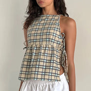 Celeste Dunmore | Plaid Sleeveless Peplum Tank Top with Bow Ties