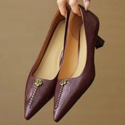 Rosanne Castellfort | Burgundy Leather Pointed-Toe Heels with Gold Rose Detail