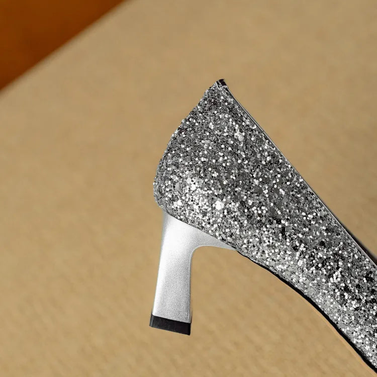 Estelle Ravenswood | Gold Glitter Block Heel Pumps with Crystal Buckle