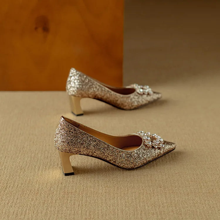 Estelle Ravenswood | Gold Glitter Block Heel Pumps with Crystal Buckle