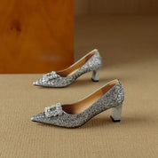 Estelle Ravenswood | Gold Glitter Block Heel Pumps with Crystal Buckle