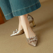 Estelle Ravenswood | Gold Glitter Block Heel Pumps with Crystal Buckle