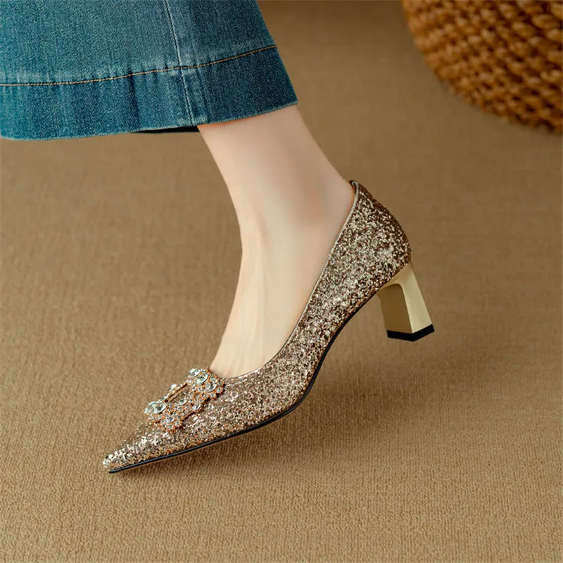 Estelle Ravenswood | Gold Glitter Block Heel Pumps with Crystal Buckle