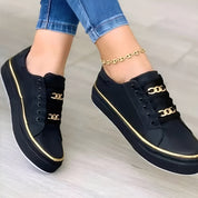 Isabeau Fairweather | White Platform Sneakers with Gold Chain Detail