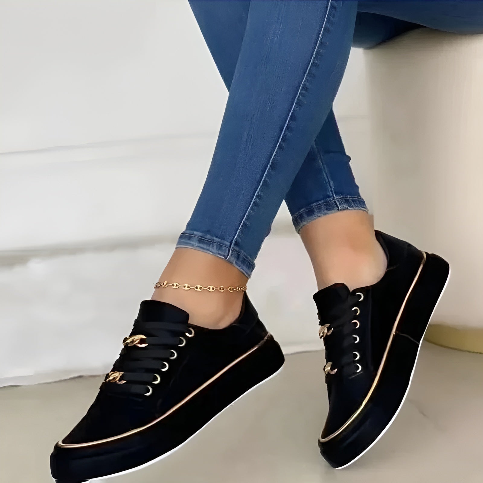 Isabeau Fairweather | White Platform Sneakers with Gold Chain Detail