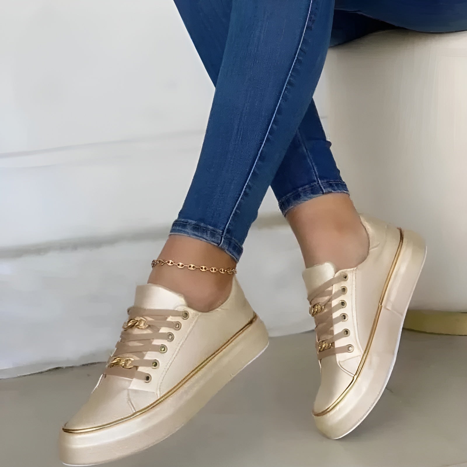 Isabeau Fairweather | White Platform Sneakers with Gold Chain Detail