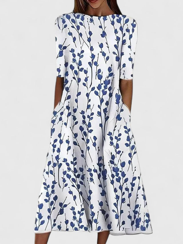 Auriane Delfortaine | Blue Floral Print Midi Dress with Short Sleeves