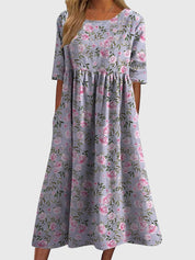 Célimène Fairgrove | Blue Floral Midi Dress with Half Sleeves