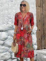 Celestine Wyndbourne | Colorful Floral Print Midi Dress with V-Neck