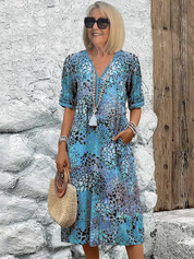 Celestine Wyndbourne | Colorful Floral Print Midi Dress with V-Neck