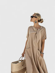 Nadège Villefort | Brown Maxi Dress with Neck Tie & Pockets