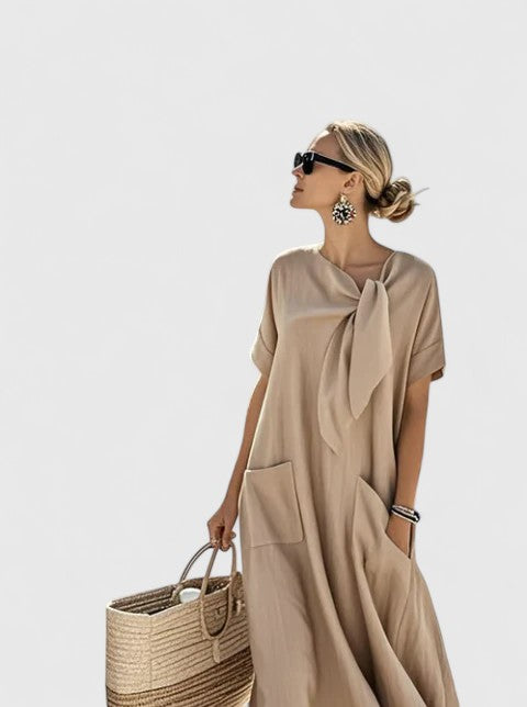 Nadège Villefort | Brown Maxi Dress with Neck Tie & Pockets