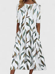 Auriane Delfortaine | Blue Floral Print Midi Dress with Short Sleeves