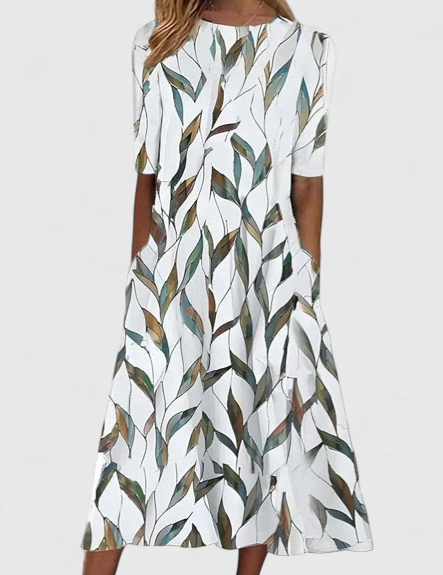 Auriane Delfortaine | Blue Floral Print Midi Dress with Short Sleeves