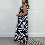 Celestine Vaubrienne | Abstract Print Wide-Leg Jumpsuit with Ruffle Cap Sleeves