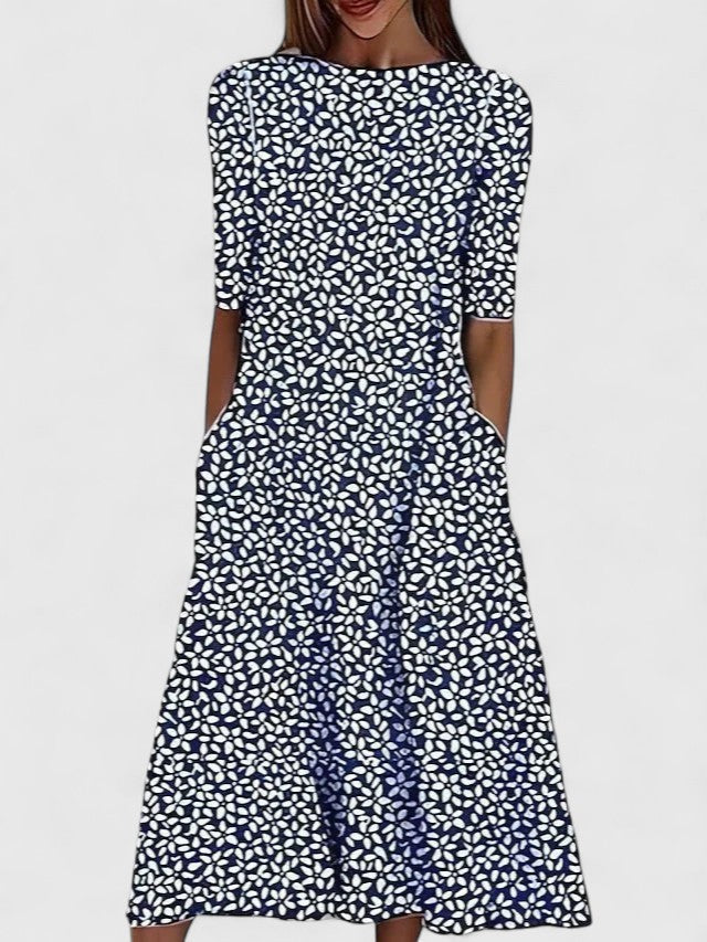 Auriane Delfortaine | Blue Floral Print Midi Dress with Short Sleeves